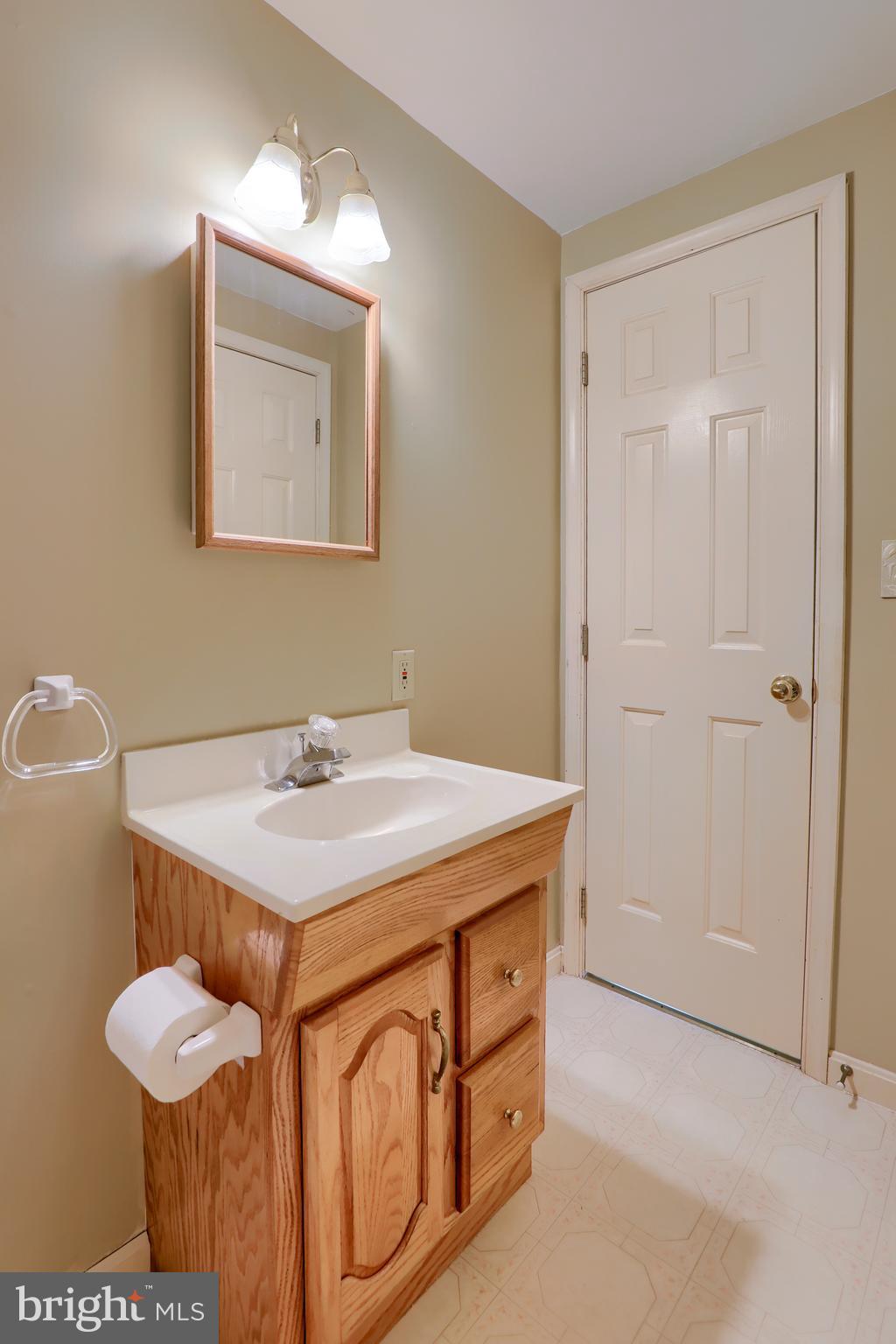 1141 Letort Road Conestoga, PA 17516 - Photo 34 of 49 a bathroom with a sink a vanity and a mirror