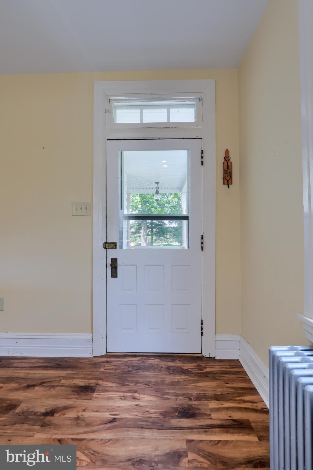 1141 Letort Road Conestoga, PA 17516 - Photo 9 of 49 a view of a hallway with wooden floor and a window