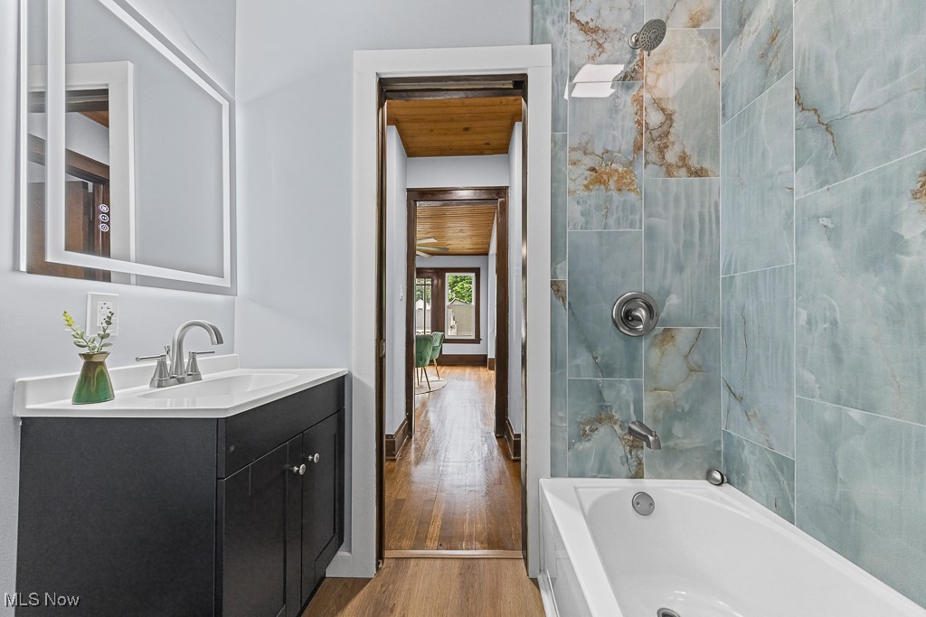3549 Kent Road Stow, OH 44224 - Photo 28 of 44 Full bath featuring wood finished floors, vanity, and shower combination