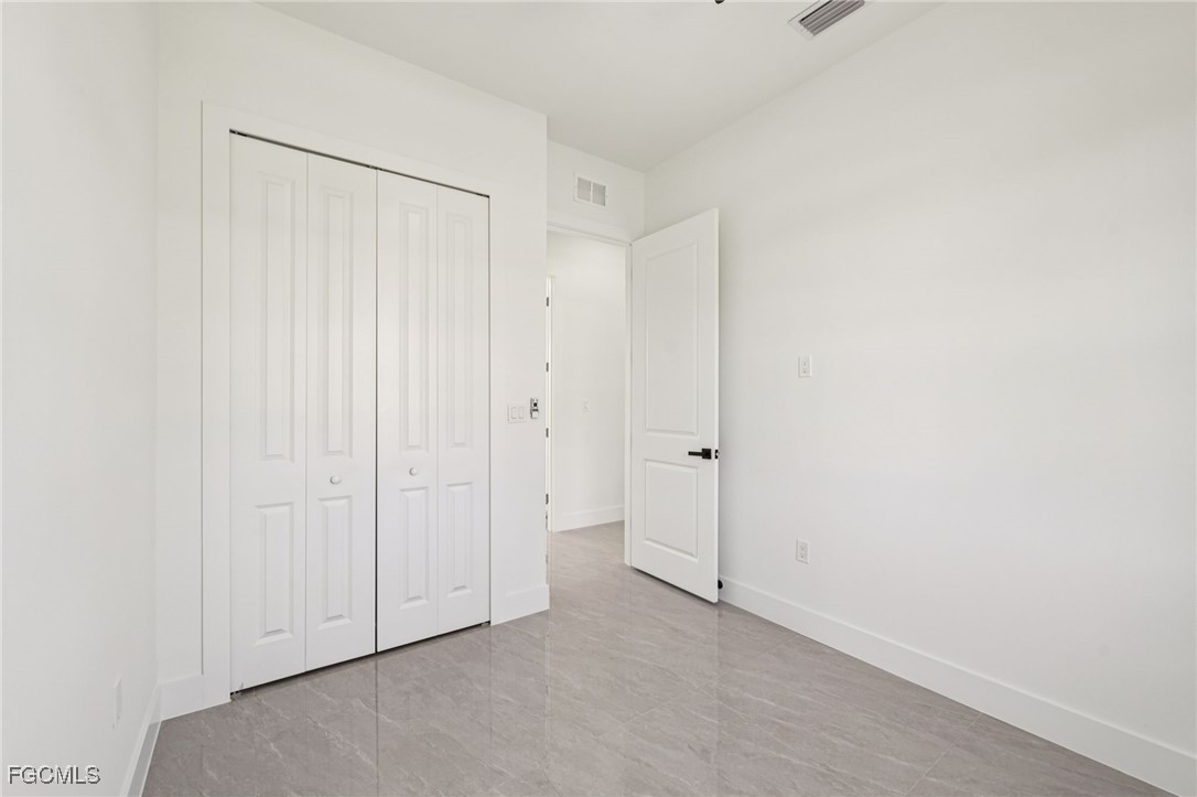 4402 East 19th Street Lehigh Acres, FL 33972 - Photo 27 of 31 a view of an empty room