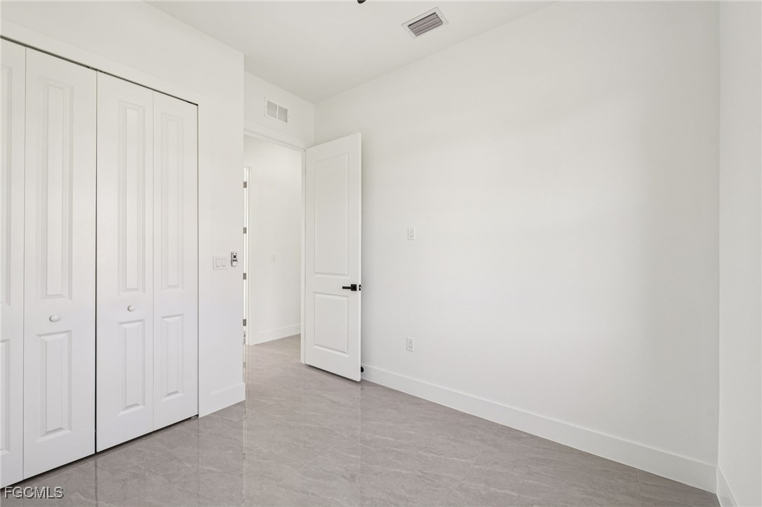 4402 East 19th Street Lehigh Acres, FL 33972 - Photo 28 of 31 a view of an empty room
