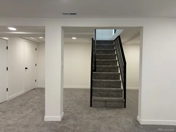 a view of a hallway with entryway