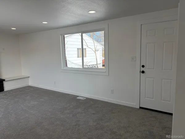 an empty room with a window