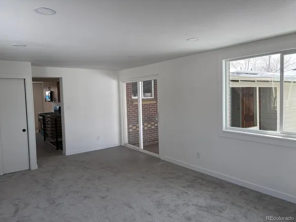 an empty room with windows