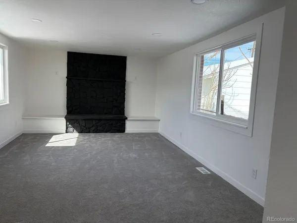 an empty room with windows