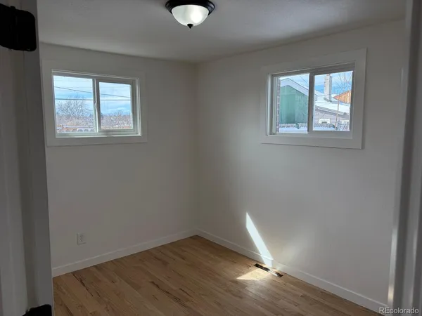an empty room that has a window