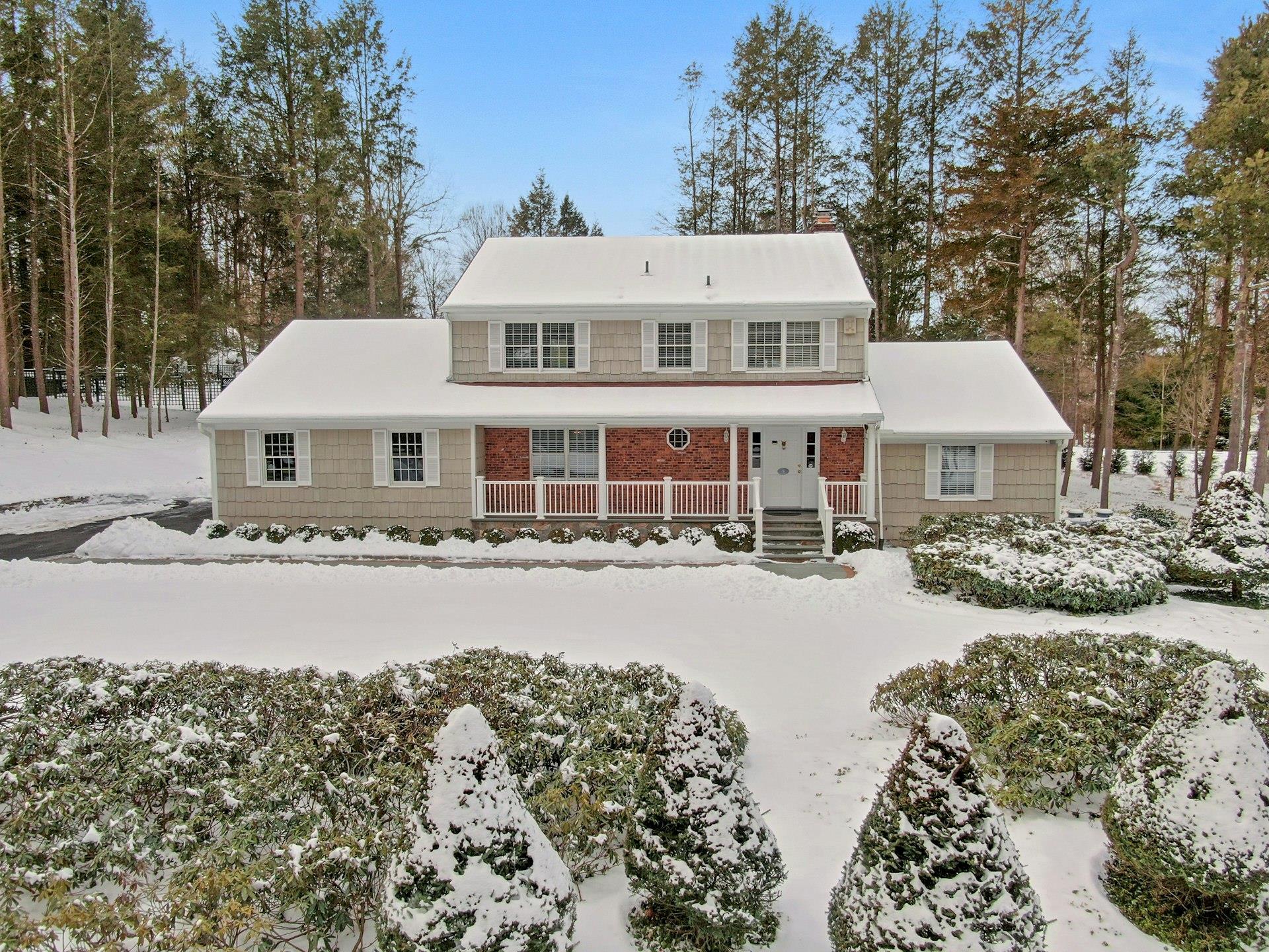 View of front of property with covered porch
