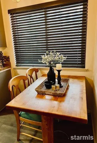a view of kitchen and dining room with furniture