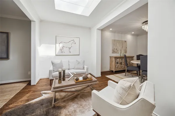 a living room with furniture and a table