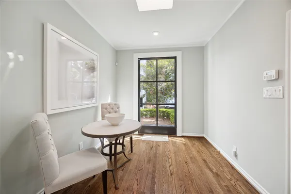 a bathroom with a sink and a window