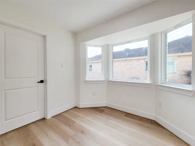a bathroom with a sink a mirror and a toilet