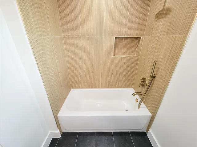 a bathroom with a sink and a bathtub