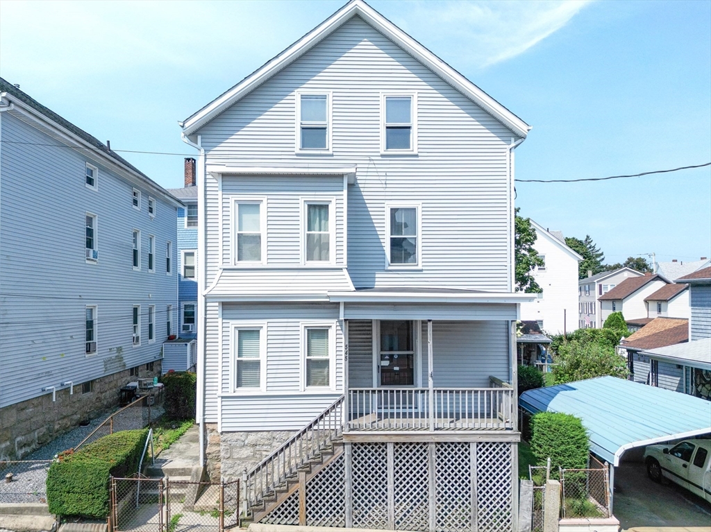 545 2nd Street Fall River, MA 02721 - Photo 2 of 22 a front view of a house with a yard