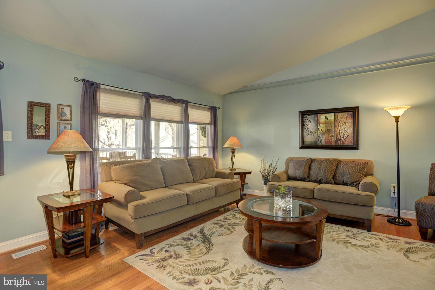 1605 Chester Mill Road Silver Spring, MD 20906 - Photo 3 of 30 Living Room with Hardwoods & Vaulted Ceiling