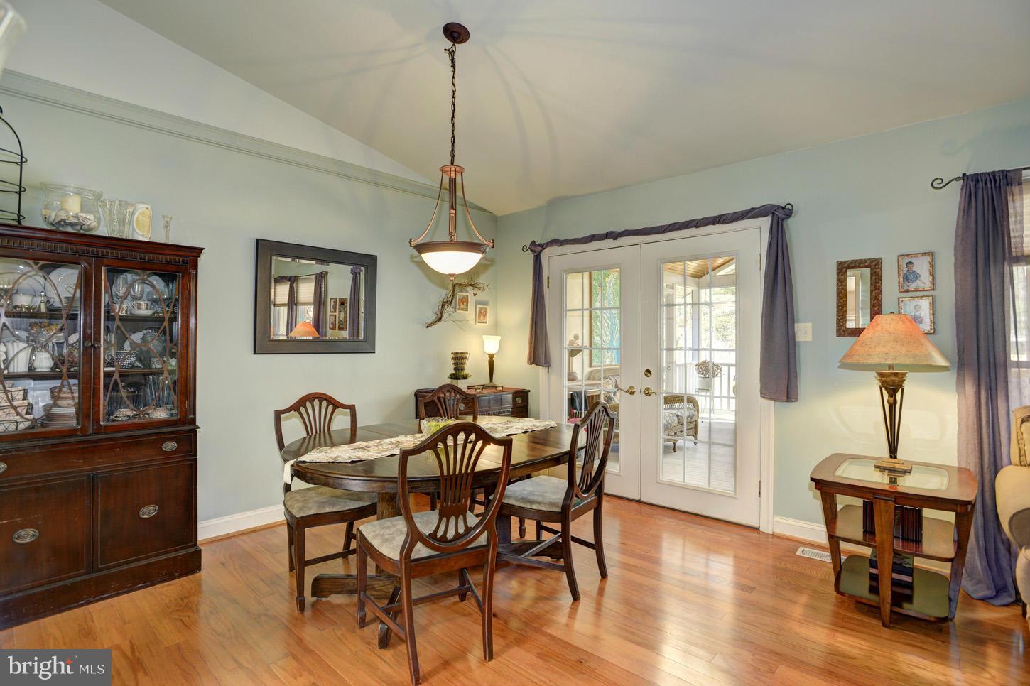 1605 Chester Mill Road Silver Spring, MD 20906 - Photo 6 of 30 Dining Room with Hardwoods & Vaulted Ceiling