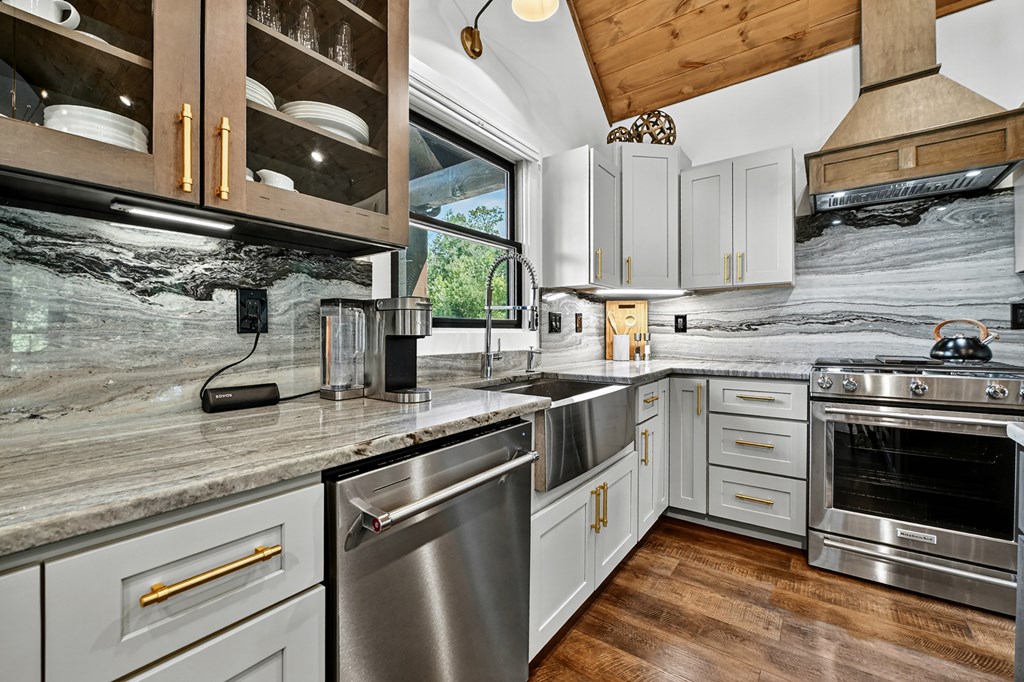 141 Long View Lane Blue Ridge, GA 30513 - Photo 12 of 61 a kitchen with stainless steel appliances granite countertop a sink a stove and cabinets