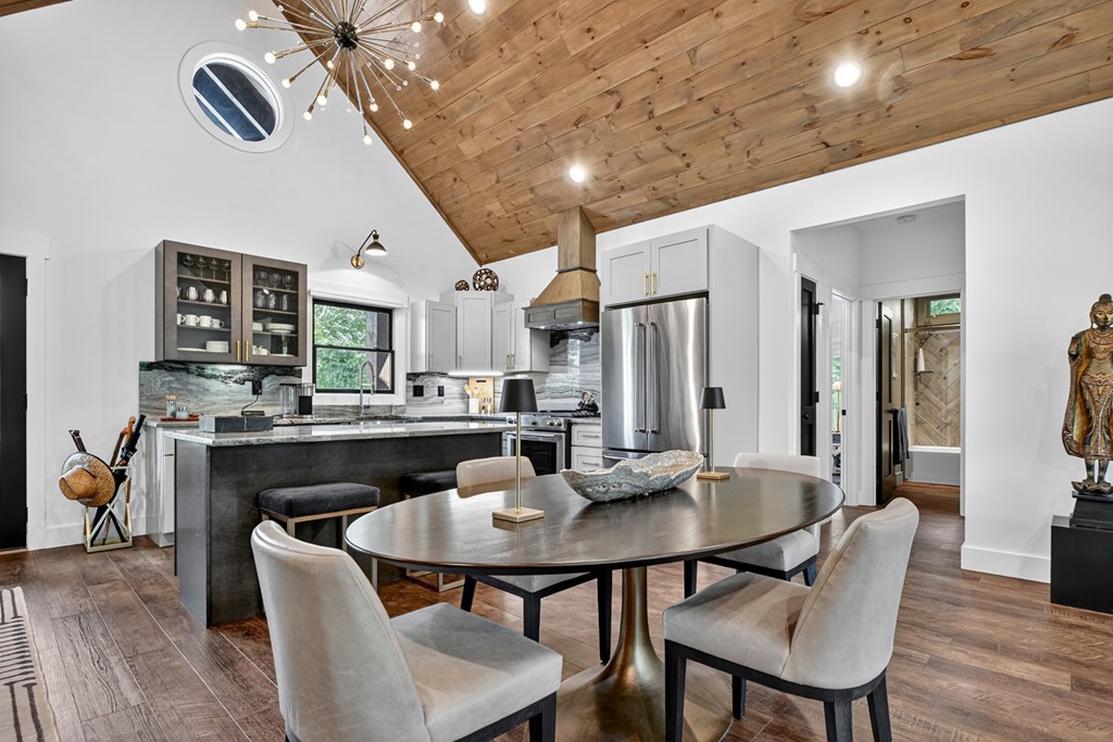 141 Long View Lane Blue Ridge, GA 30513 - Photo 13 of 61 a dining room with furniture and wooden floor