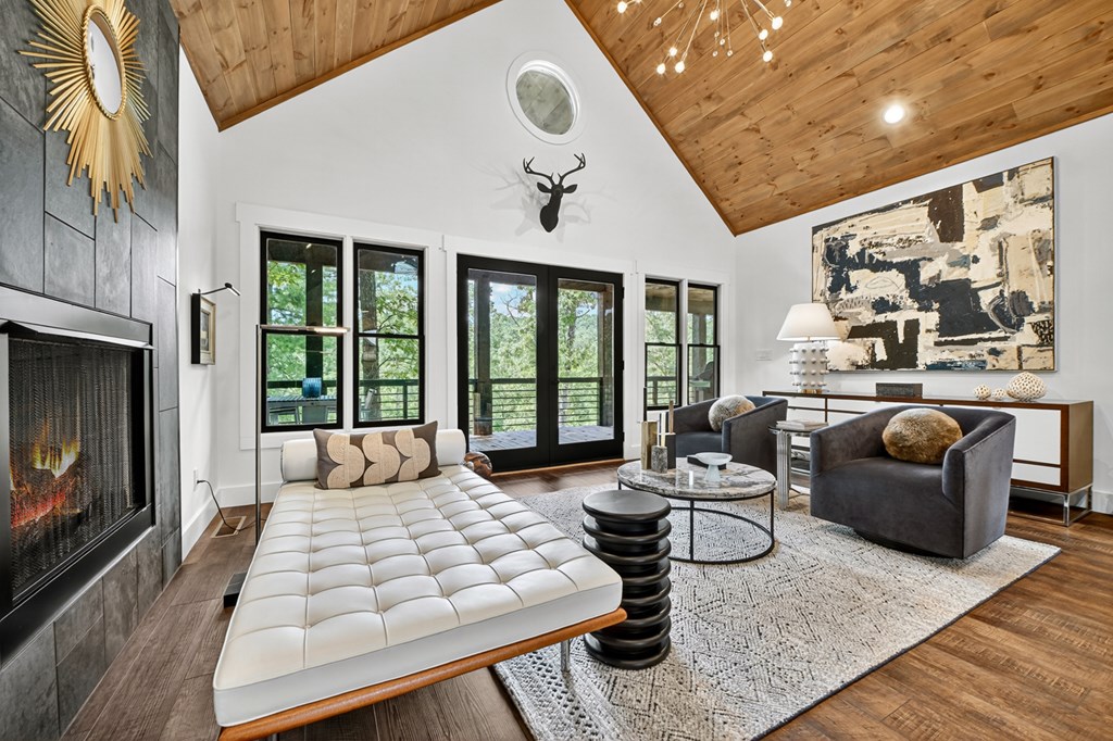 141 Long View Lane Blue Ridge, GA 30513 - Photo 18 of 61 a bedroom with furniture and a flat screen tv