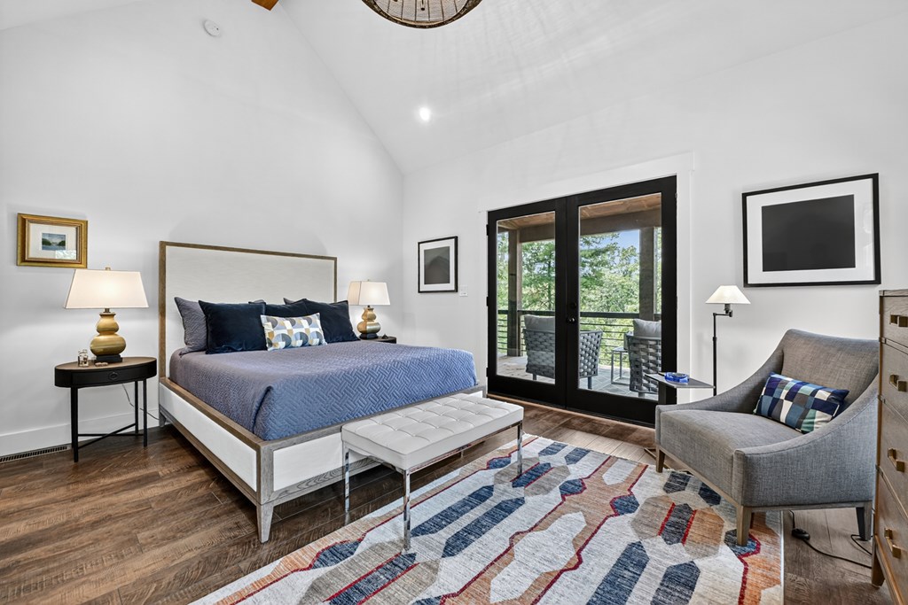 141 Long View Lane Blue Ridge, GA 30513 - Photo 28 of 61 a bedroom with a bed a couch and a window