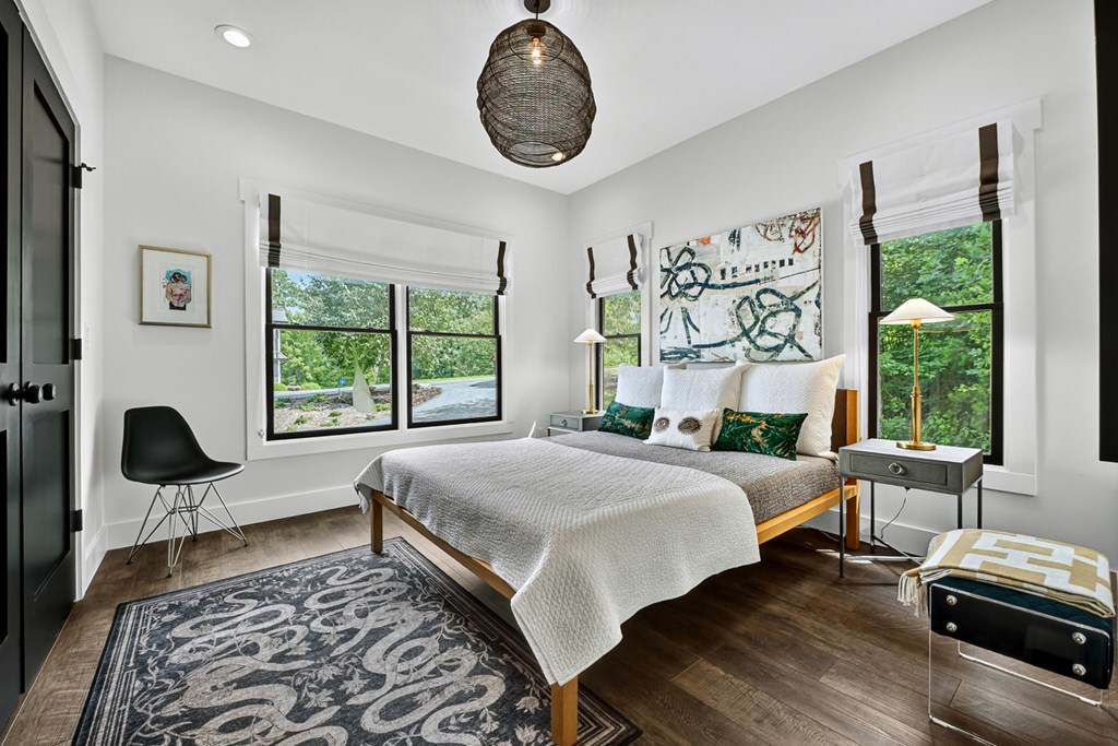 141 Long View Lane Blue Ridge, GA 30513 - Photo 34 of 61 a bed sitting in a bedroom next to a window