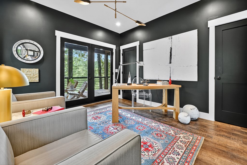 141 Long View Lane Blue Ridge, GA 30513 - Photo 37 of 61 a living room with furniture a window and a chandelier