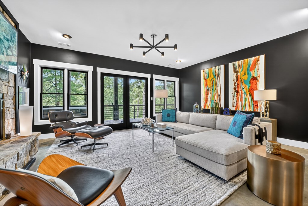 141 Long View Lane Blue Ridge, GA 30513 - Photo 41 of 61 a living room with furniture ceiling fan and a large window