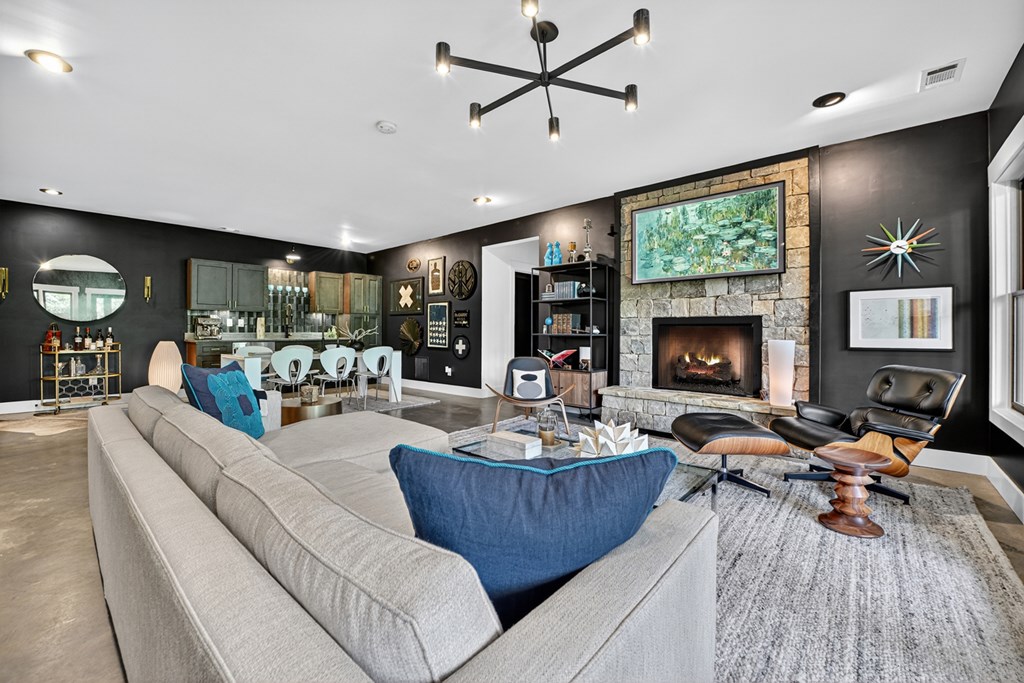 141 Long View Lane Blue Ridge, GA 30513 - Photo 44 of 61 a living room with furniture and a fireplace