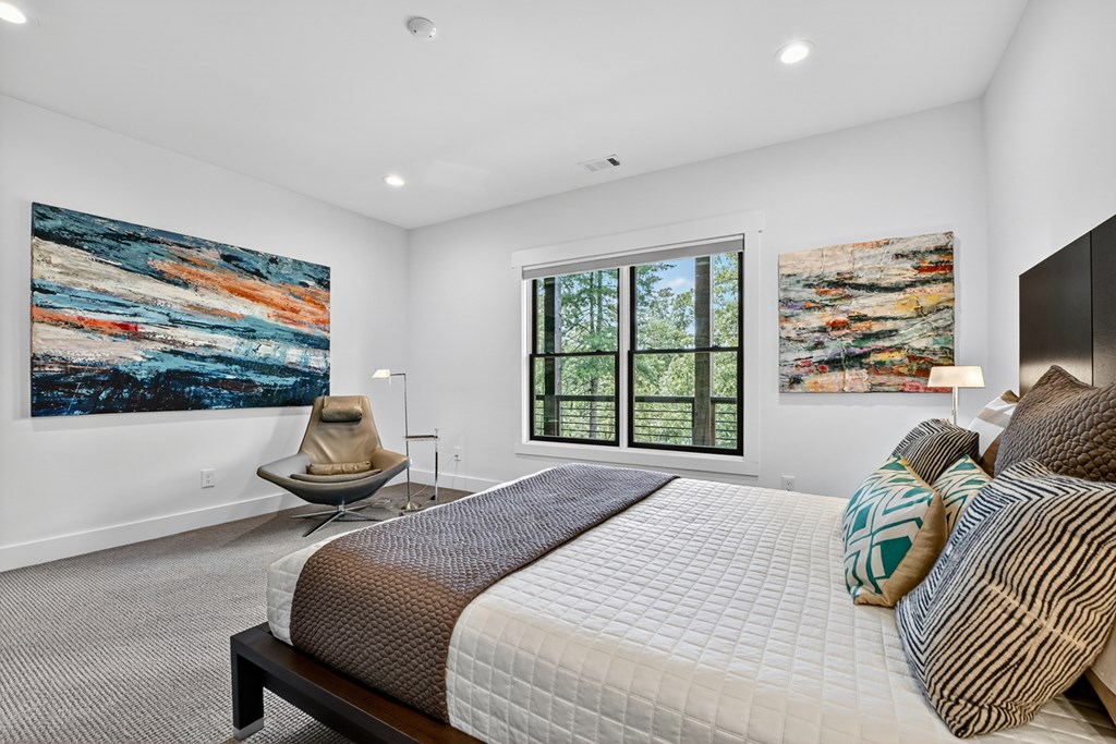 141 Long View Lane Blue Ridge, GA 30513 - Photo 46 of 61 a bedroom with a bed and a flat screen tv