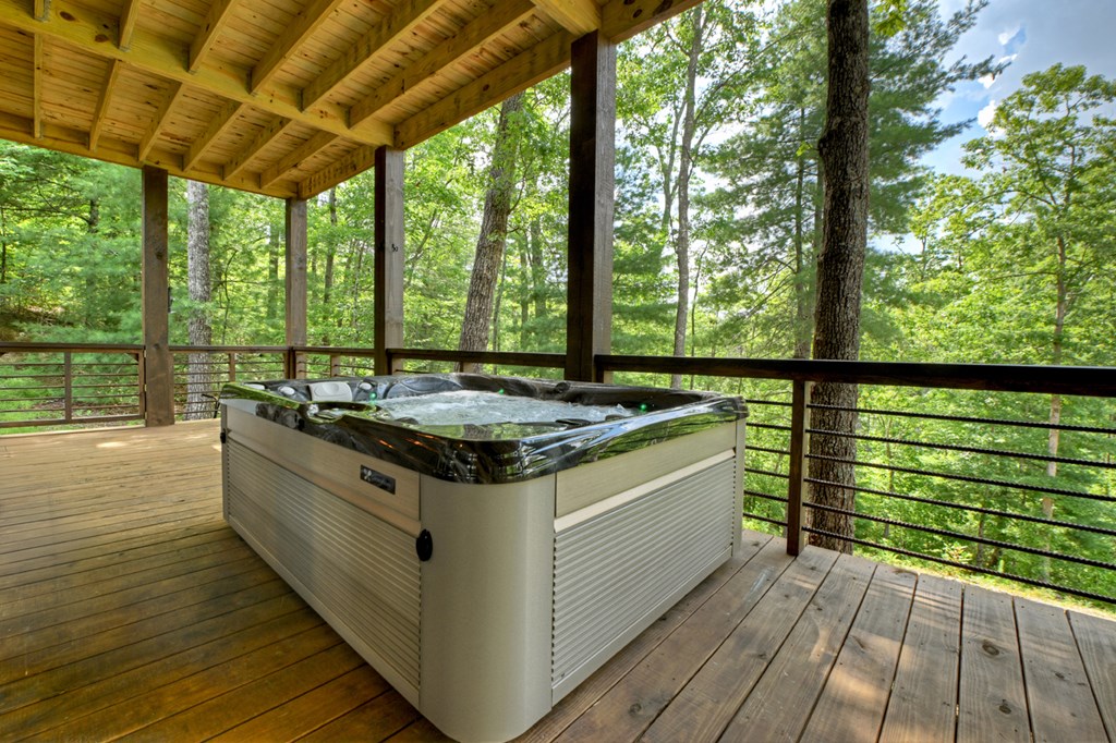 141 Long View Lane Blue Ridge, GA 30513 - Photo 52 of 61 a view of outdoor kitchen with stainless steel appliances granite countertop a stove and a large window