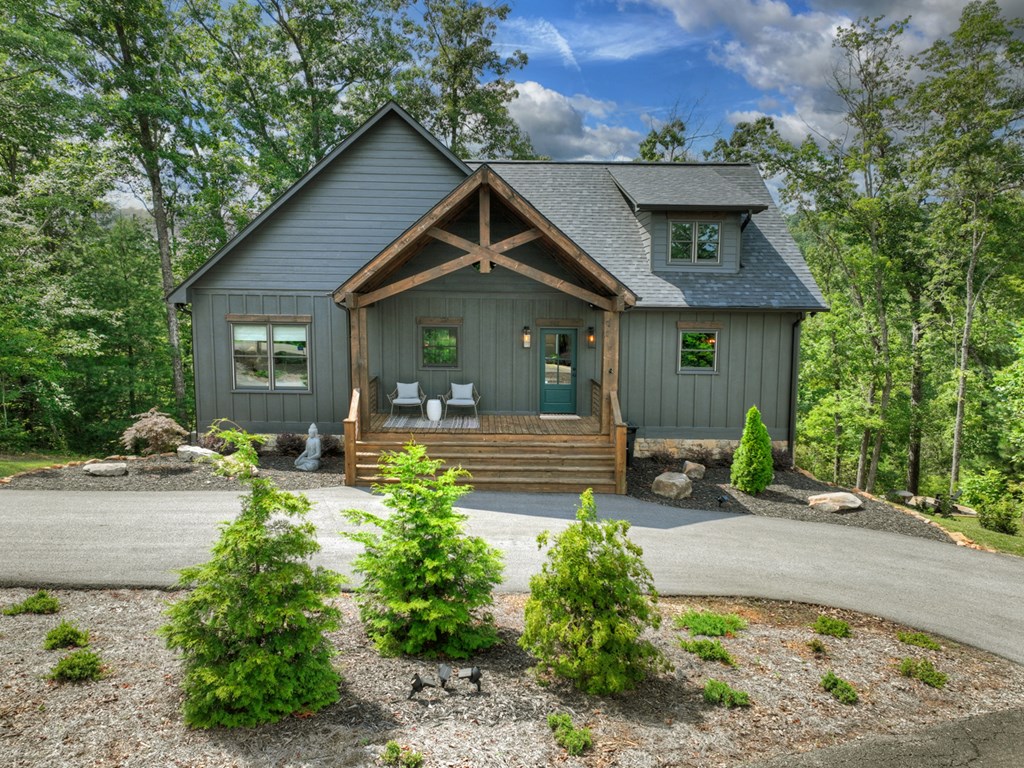 141 Long View Lane Blue Ridge, GA 30513 - Photo 58 of 61 a front view of a house with garden