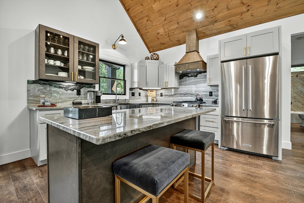 141 Long View Lane Blue Ridge, GA 30513 - Photo 9 of 61 a kitchen with stainless steel appliances granite countertop a sink stove and refrigerator