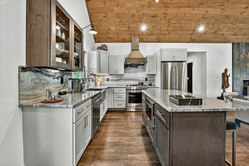 141 Long View Lane Blue Ridge, GA 30513 - Photo 10 of 61 a kitchen with stainless steel appliances a sink stove and cabinets