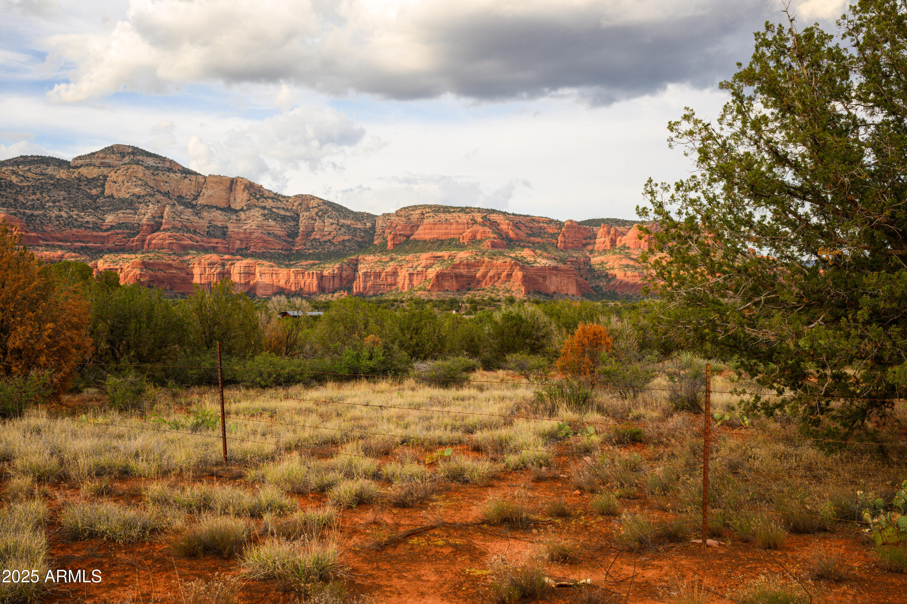 55 Estrella Road, Unit 5 Sedona, AZ 86336 - Photo 33 of 61 a view of a city with mountains in the background