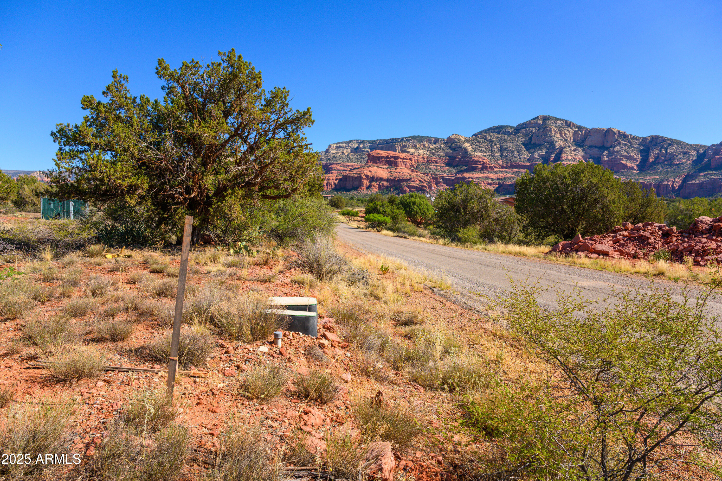 55 Estrella Road, Unit 5 Sedona, AZ 86336 - Photo 60 of 61 a view of a yard with a tree