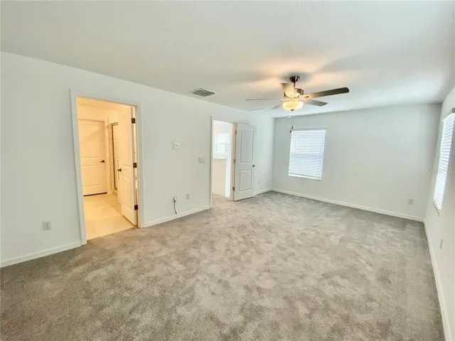 an empty room with a bathroom