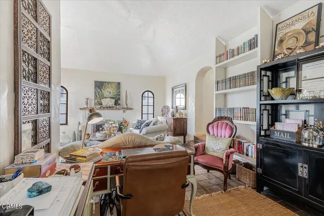 a view of a dining room with furniture wooden floor and chandelier