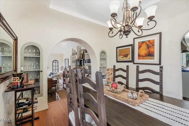 a kitchen with stainless steel appliances granite countertop a stove and a refrigerator