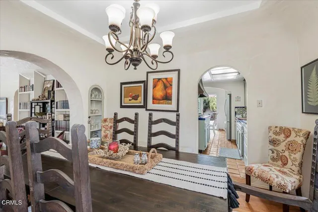 a kitchen with a sink and a stove top oven
