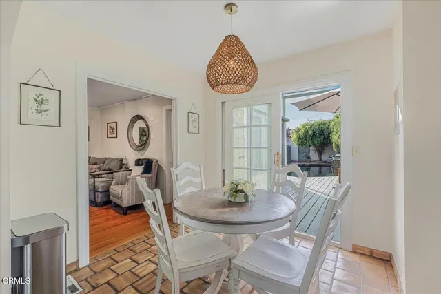 a bedroom with a bed window and a couch