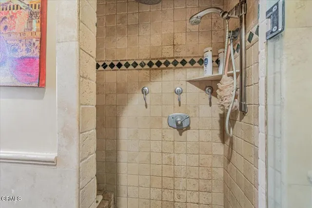 a kitchen with a sink and a refrigerator