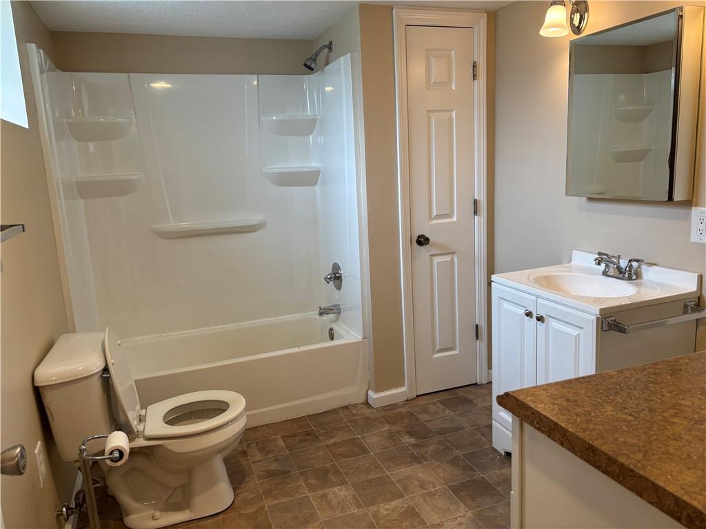 264 Hopwood Fairchance Road Uniontown, PA 15401 - Photo 8 of 19 a bathroom with a sink toilet and shower