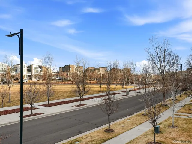 a view of a city with an ocean view