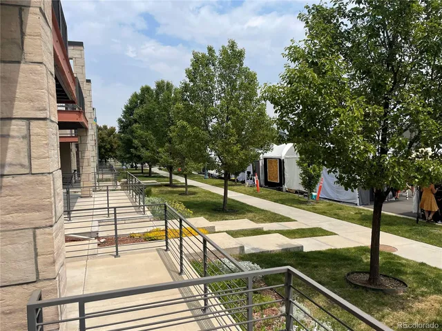 a view of swimming pool with chairs