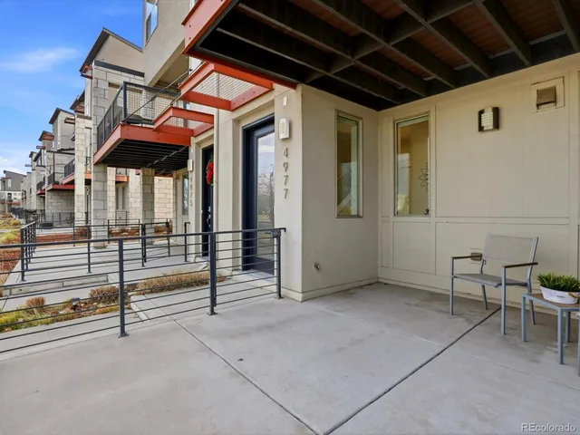 a view of a porch with furniture
