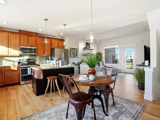 a view of a dining room with furniture