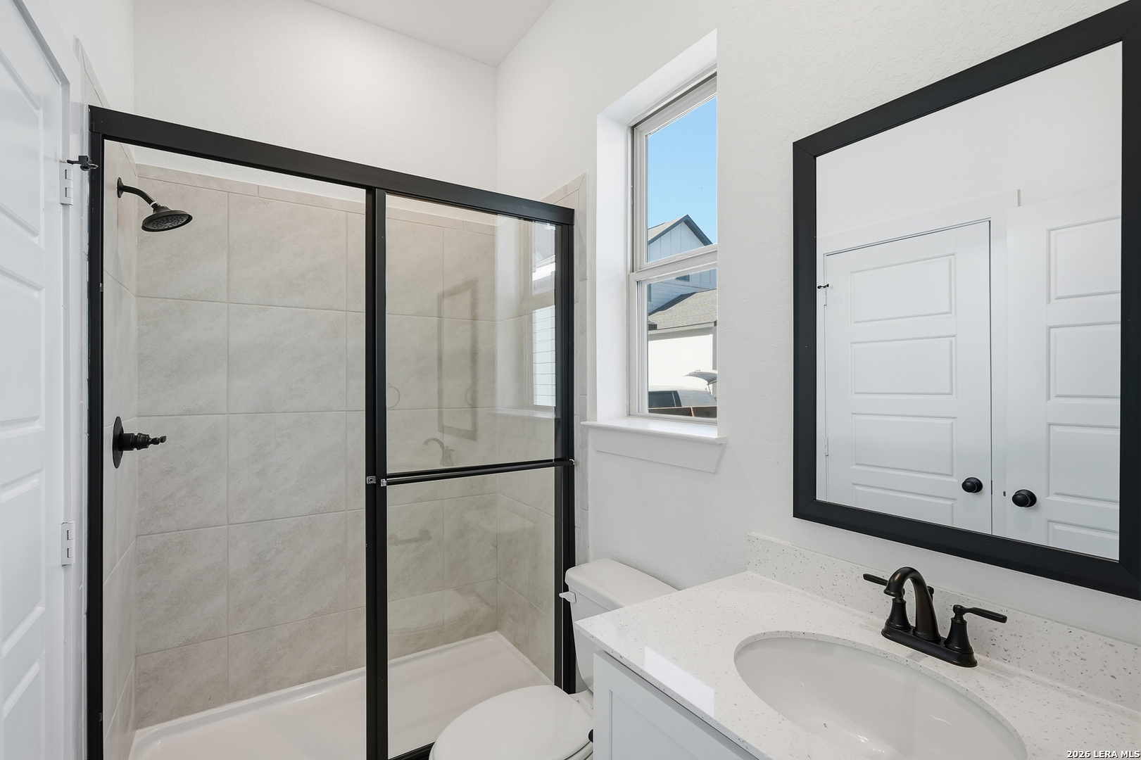 9414 Chatside Schertz, TX 78154 - Photo 18 of 37 a bathroom with a sink and a mirror