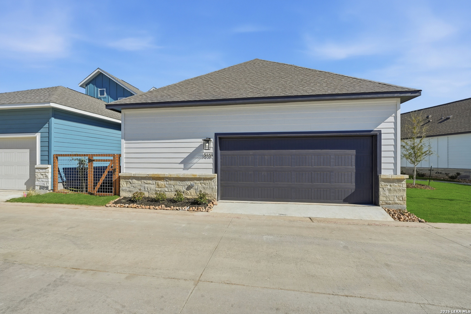 9414 Chatside Schertz, TX 78154 - Photo 29 of 37 a front view of a house with a yard and garage