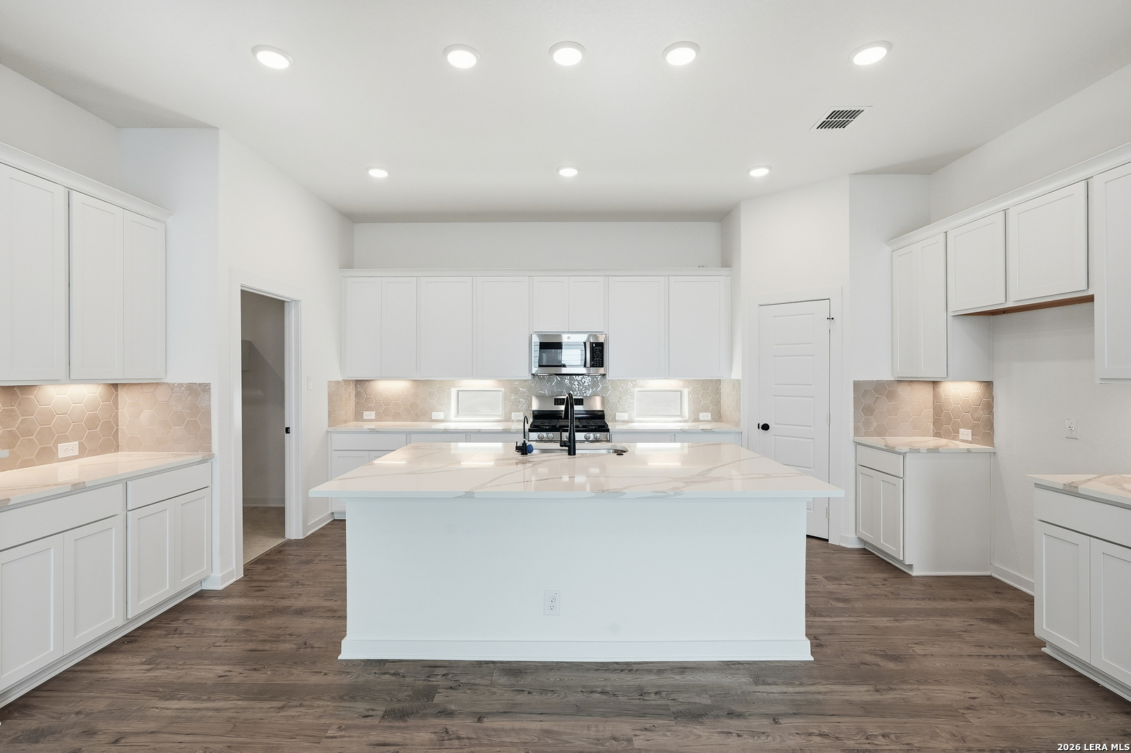 9414 Chatside Schertz, TX 78154 - Photo 37 of 37 a view of kitchen with white cabinets appliances and chandelier