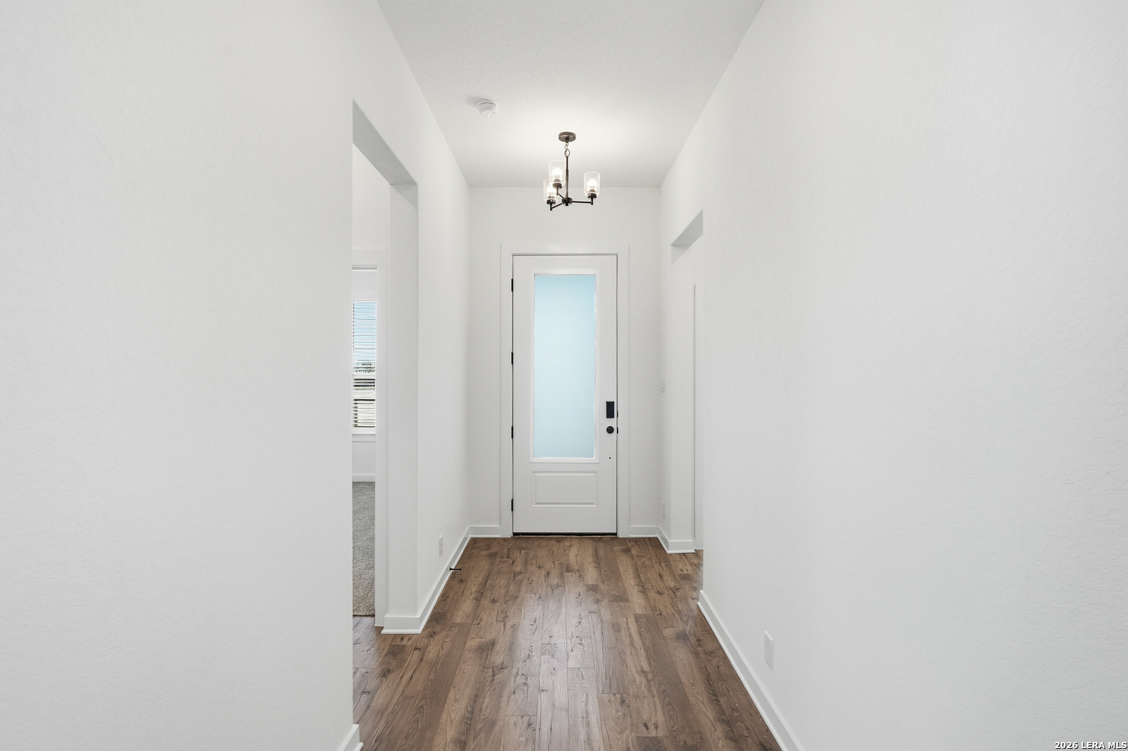 9414 Chatside Schertz, TX 78154 - Photo 6 of 37 a view of a hallway with wooden floor