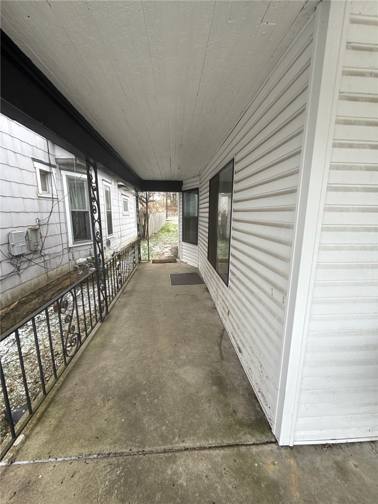 1125 West High Street Springfield, OH 45506 - Photo 39 of 39 This inviting covered porch provides a sheltered entry and an ideal spot for quiet enjoyment.